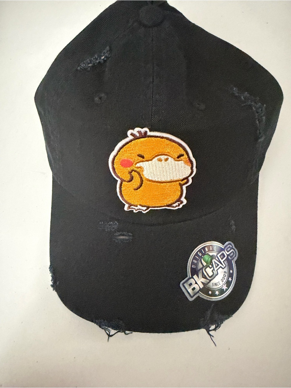 Black Distressed Cap pokemon pysduck
